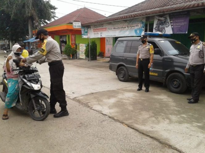 
 Polsek Cibarusah ‘Woro-Woro’ Cegah Covid 19
