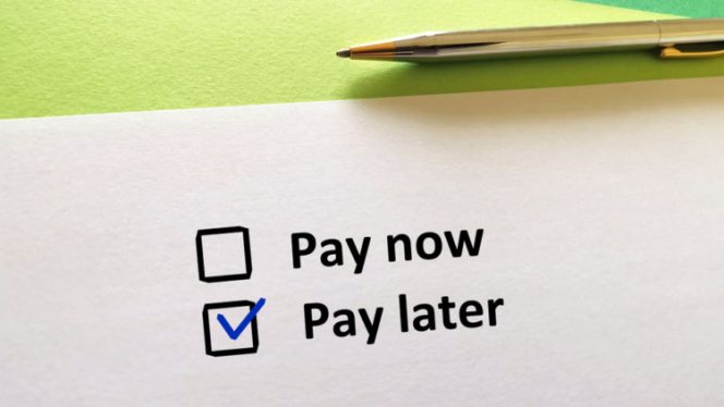 
 One person is answering question. He chooses to pay later.